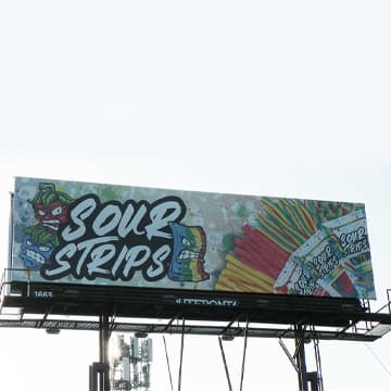 out of home billboard advertising sour strips